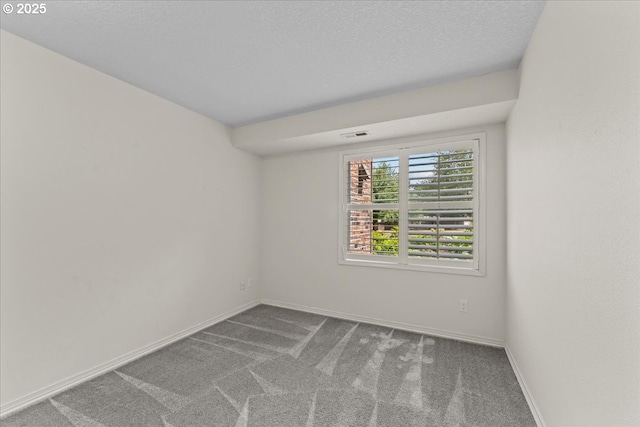 15420 NE Knott St Unit 2, Portland, OR 97230 - carpeted spare room featuring baseboards and a textured ceiling