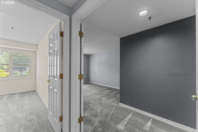 15420 NE Knott St Unit 2, Portland, OR 97230 - corridor with carpet floors, baseboards, and a textured ceiling