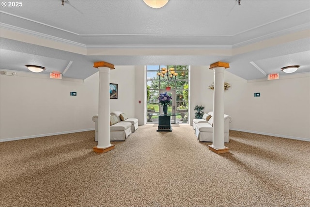 15420 NE Knott St Unit 2, Portland, OR 97230 - living area with ornate columns, carpet, baseboards, a textured ceiling, and crown molding