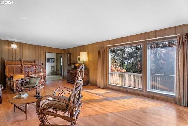 6455 SW Scholls Ferry Rd, Portland, OR 97223 - living room with wood walls and light wood-type flooring