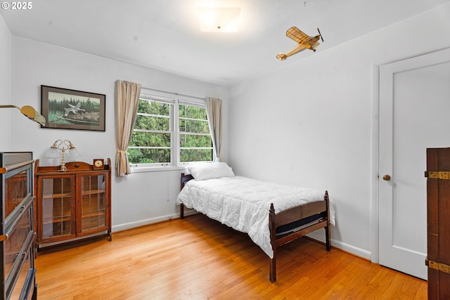 6455 SW Scholls Ferry Rd, Portland, OR 97223 - bedroom featuring light wood-style floors and baseboards