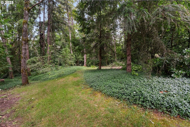 6455 SW Scholls Ferry Rd, Portland, OR 97223 - view of grassy yard featuring a wooded view