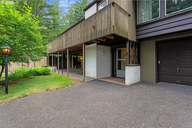 6455 SW Scholls Ferry Rd, Portland, OR 97223 - entrance to property featuring a balcony and brick siding