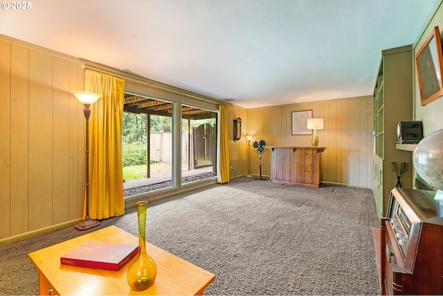 6455 SW Scholls Ferry Rd, Portland, OR 97223 - unfurnished living room featuring carpet floors and wood walls
