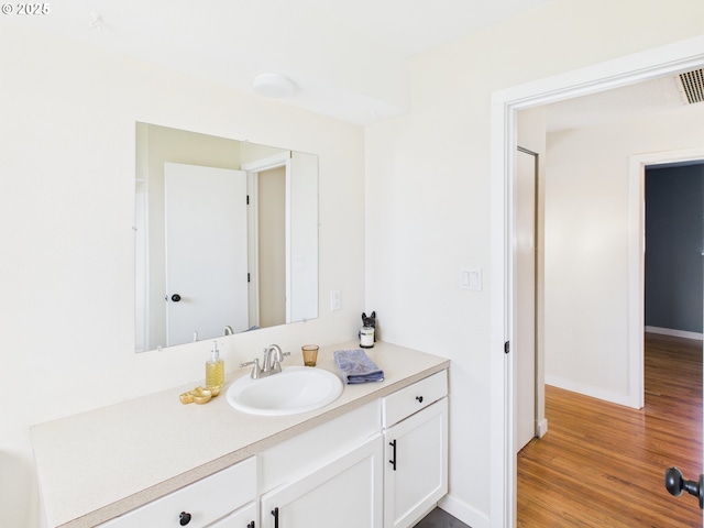 415 NE 99th St, Vancouver, WA 98665 - bathroom featuring vanity and wood finished floors