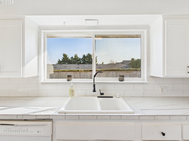 415 NE 99th St, Vancouver, WA 98665 - kitchen featuring dishwasher, tasteful backsplash, white cabinets, and light countertops