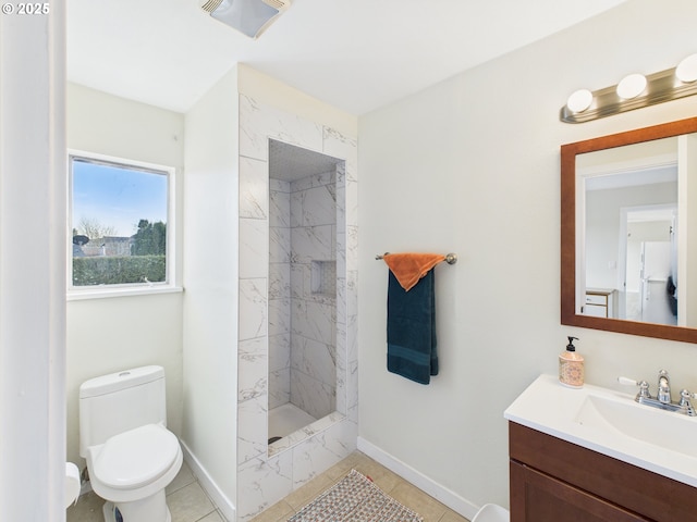 415 NE 99th St, Vancouver, WA 98665 - bathroom featuring vanity, a marble finish shower, and tile patterned floors
