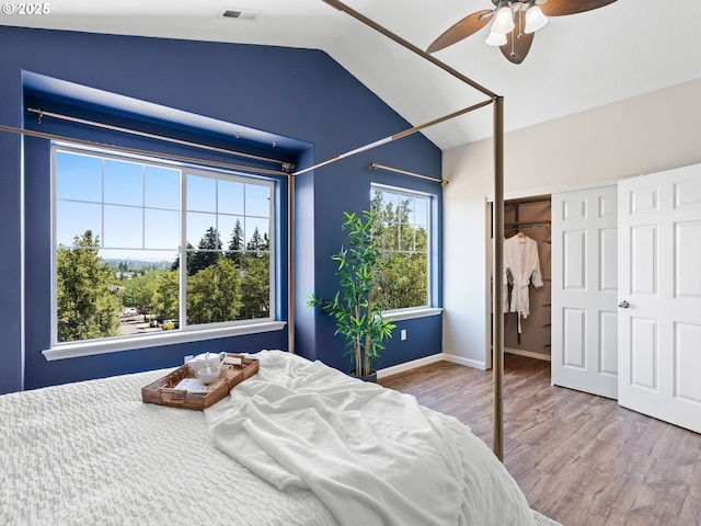 13143 SW Brianne Way, Portland, OR 97223 - bedroom with lofted ceiling, wood finished floors, a closet, and ceiling fan