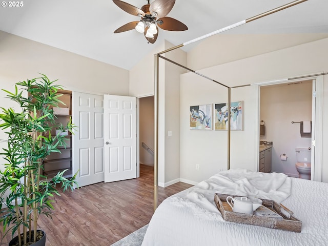 13143 SW Brianne Way, Portland, OR 97223 - bedroom featuring high vaulted ceiling, wood finished floors, ensuite bath, and ceiling fan