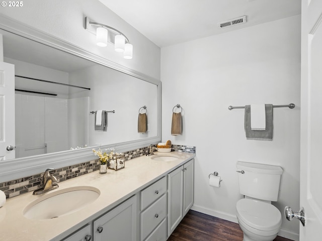 13143 SW Brianne Way, Portland, OR 97223 - full bath featuring double vanity, tasteful backsplash, wood finished floors, and a shower