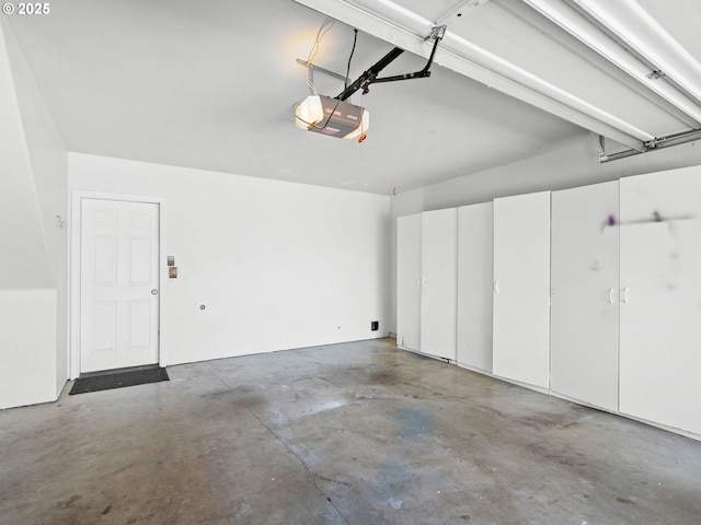 13143 SW Brianne Way, Portland, OR 97223 - garage featuring a garage door opener