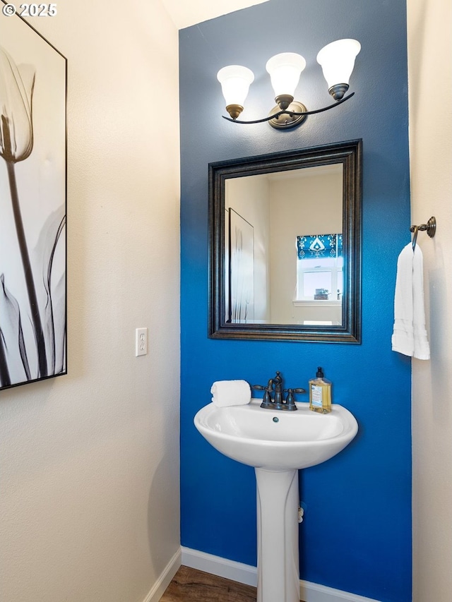 13143 SW Brianne Way, Portland, OR 97223 - bathroom with baseboards and wood finished floors