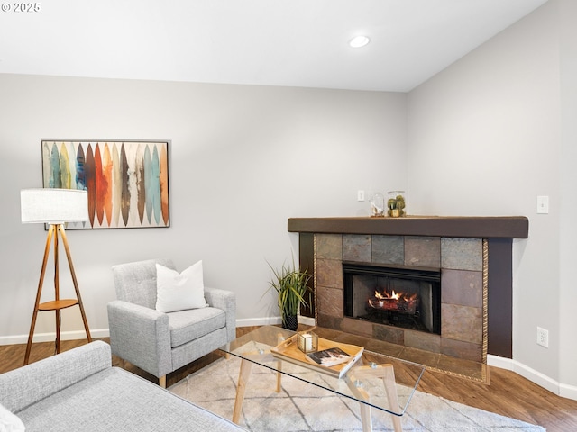13143 SW Brianne Way, Portland, OR 97223 - living room featuring wood finished floors, a tile fireplace, and recessed lighting