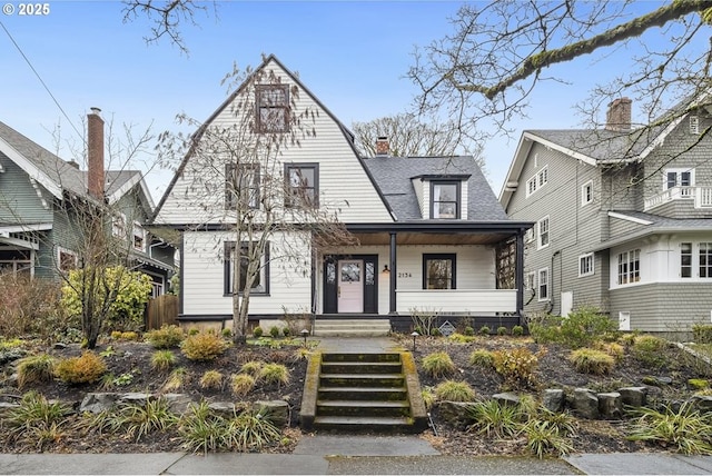 view of front of property featuring covered porch