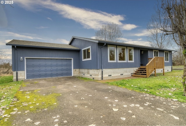 ranch-style home with a garage