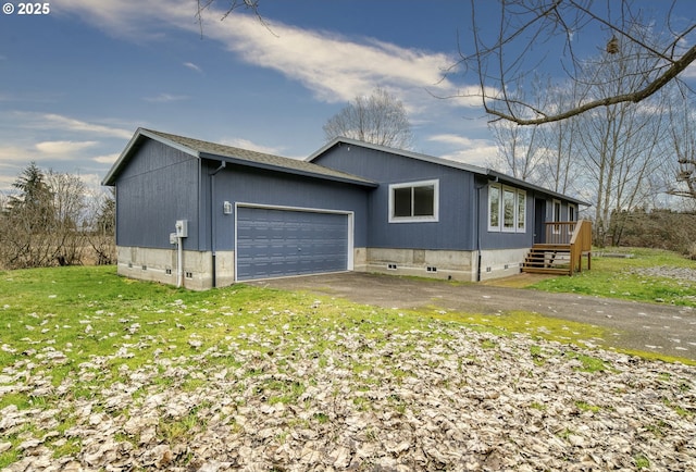 view of property exterior with a yard and a garage