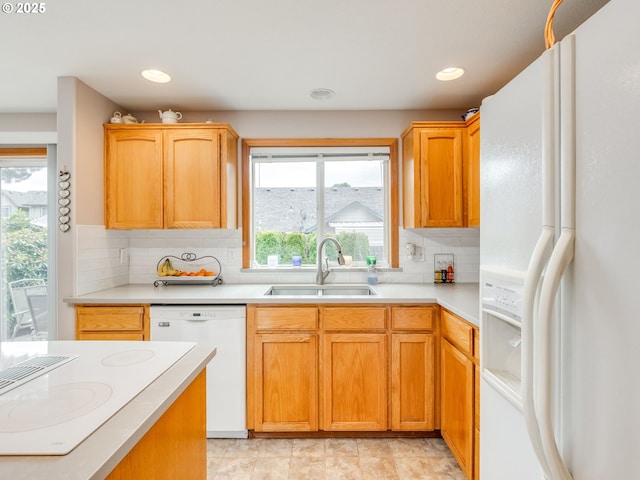 1136 S Pine St, Canby, OR 97013 - kitchen with white appliances, decorative backsplash, light countertops, and recessed lighting