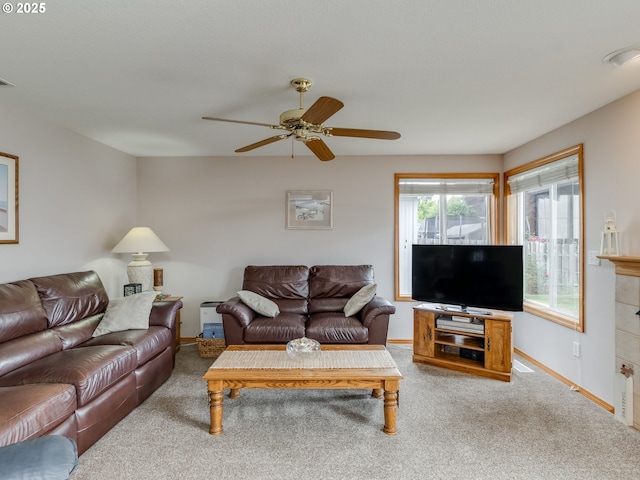 1136 S Pine St, Canby, OR 97013 - carpeted living area with ceiling fan and baseboards