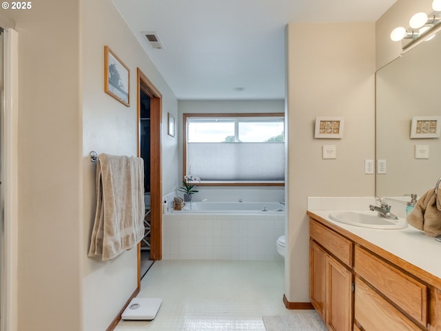 1136 S Pine St, Canby, OR 97013 - bathroom featuring vanity and a garden tub