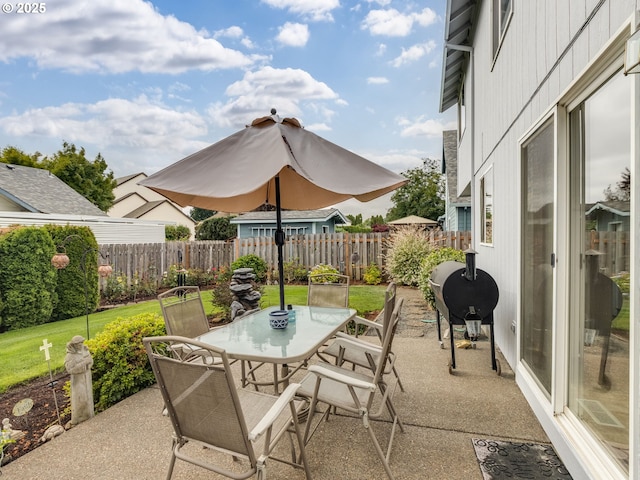 1136 S Pine St, Canby, OR 97013 - fenced backyard with outdoor dining space, a patio, and grilling area