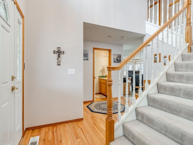 1136 S Pine St, Canby, OR 97013 - entryway with wood finished floors, stairway, and a high ceiling