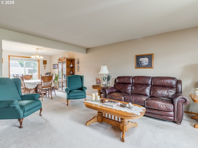 1136 S Pine St, Canby, OR 97013 - carpeted living room with a chandelier and baseboards