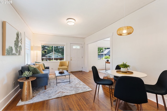 9935 N Lombard St, Portland, OR 97203 - living room with wood finished floors, plenty of natural light, and baseboards
