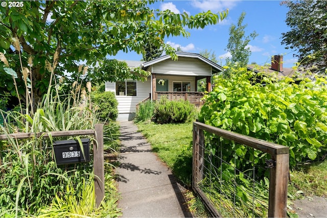 9935 N Lombard St, Portland, OR 97203 - view of front of house with a porch