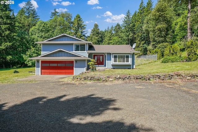 16170 Mcbee Rd, Dallas, OR 97338 - split level home featuring dirt driveway and an attached garage