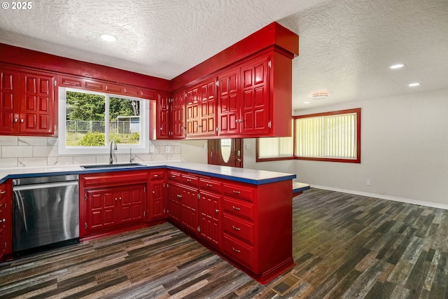 16170 Mcbee Rd, Dallas, OR 97338 - kitchen with dishwasher, a sink, dark wood-style flooring, a textured ceiling, and tasteful backsplash