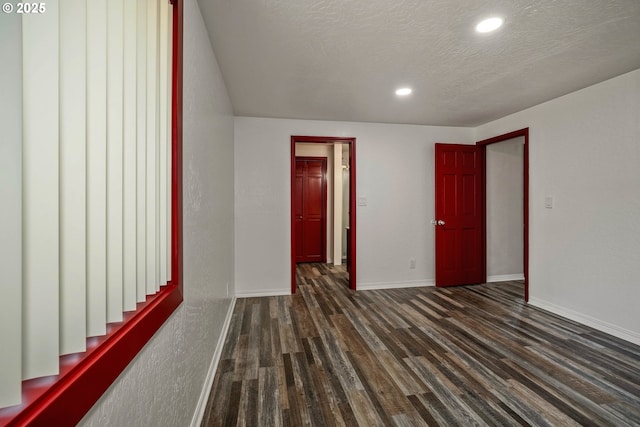 16170 Mcbee Rd, Dallas, OR 97338 - spare room with dark wood-style floors, recessed lighting, baseboards, and a textured ceiling