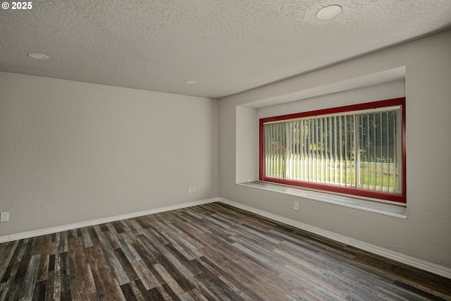 16170 Mcbee Rd, Dallas, OR 97338 - unfurnished room featuring dark wood finished floors, a textured ceiling, baseboards, and recessed lighting
