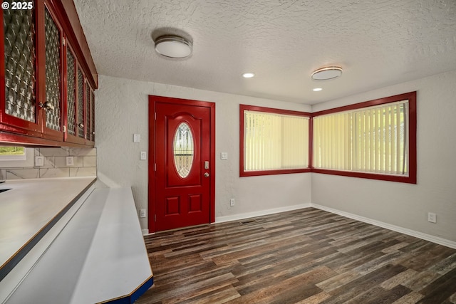 16170 Mcbee Rd, Dallas, OR 97338 - foyer with dark wood finished floors, a textured ceiling, recessed lighting, and baseboards