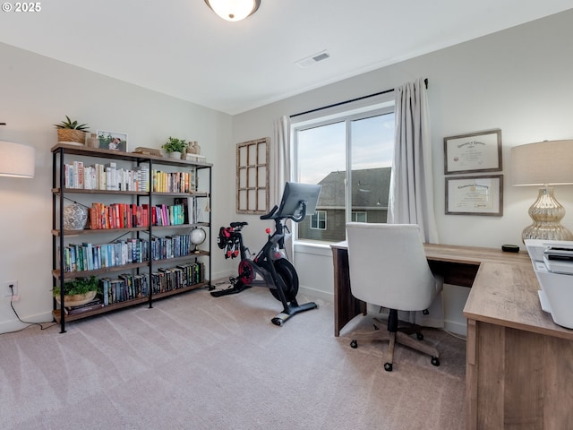 view of carpeted home office