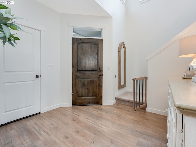 foyer with light wood-type flooring