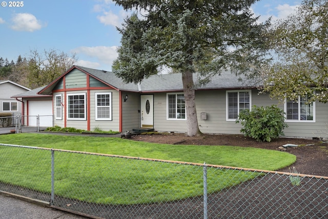 ranch-style home with entry steps, fence, roof with shingles, a front yard, and a garage