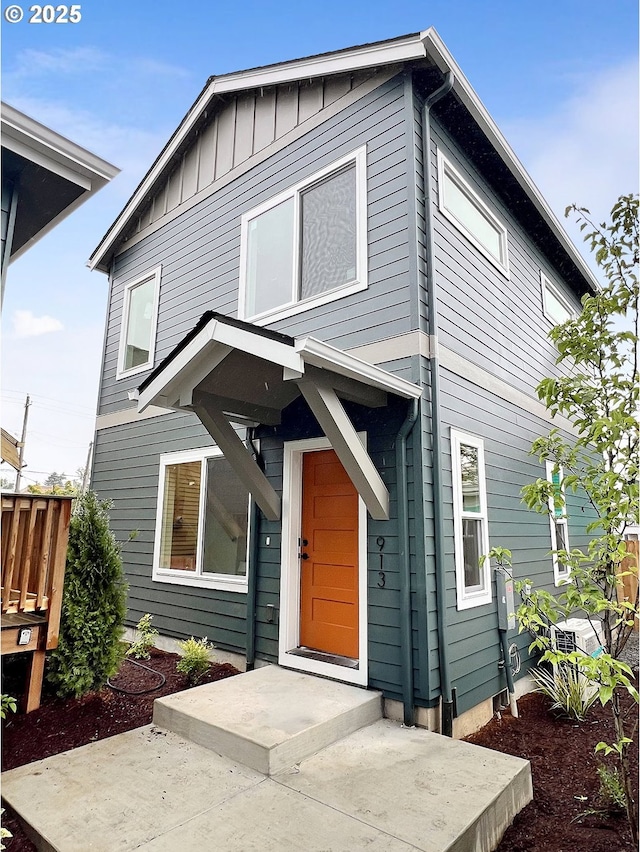 913 NE Sumner St, Portland, OR 97211 - view of front of house with board and batten siding