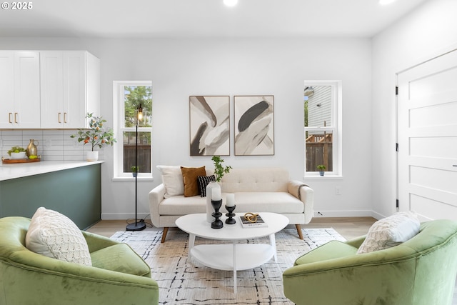 913 NE Sumner St, Portland, OR 97211 - living area featuring light wood-style flooring and recessed lighting