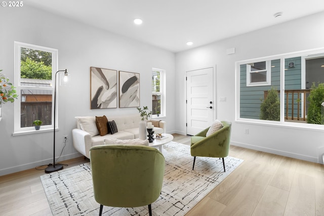 913 NE Sumner St, Portland, OR 97211 - living area featuring healthy amount of natural light, light wood-style floors, and recessed lighting