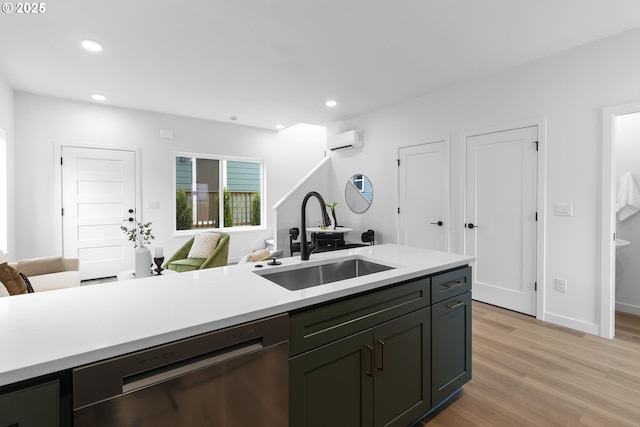 913 NE Sumner St, Portland, OR 97211 - kitchen with stainless steel dishwasher, open floor plan, light countertops, and recessed lighting