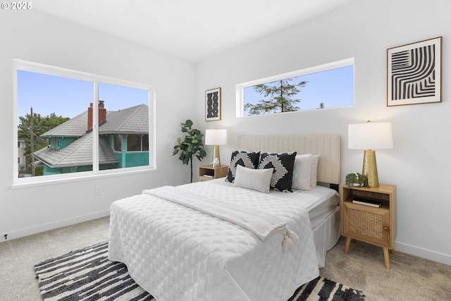 913 NE Sumner St, Portland, OR 97211 - bedroom with carpet and baseboards