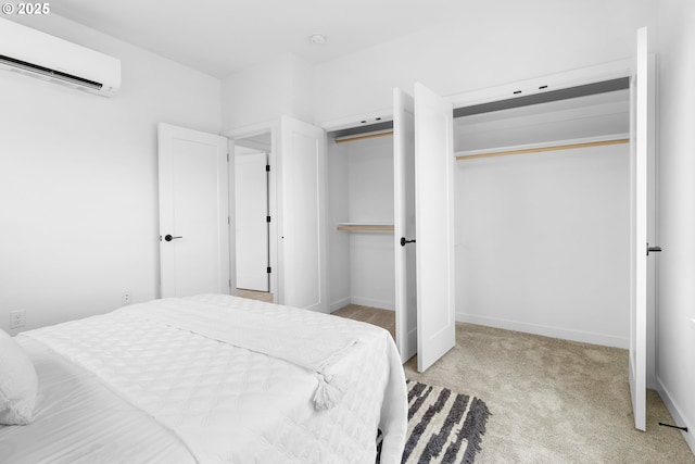 913 NE Sumner St, Portland, OR 97211 - bedroom featuring an AC wall unit, carpet floors, and a closet