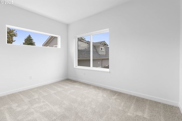 913 NE Sumner St, Portland, OR 97211 - carpeted empty room featuring baseboards