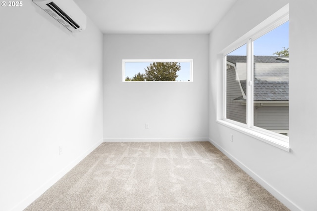 913 NE Sumner St, Portland, OR 97211 - spare room featuring a wall unit AC and carpet flooring