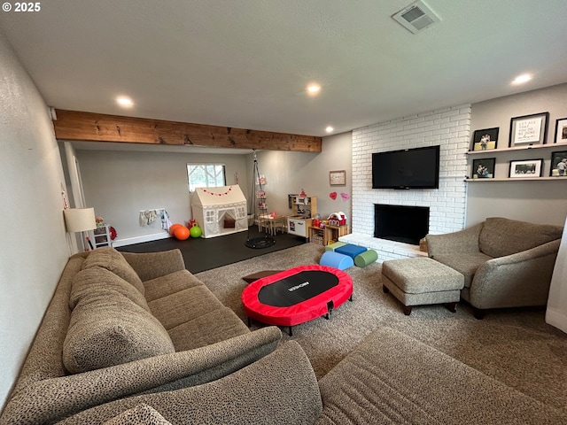 living room featuring a brick fireplace and carpet flooring