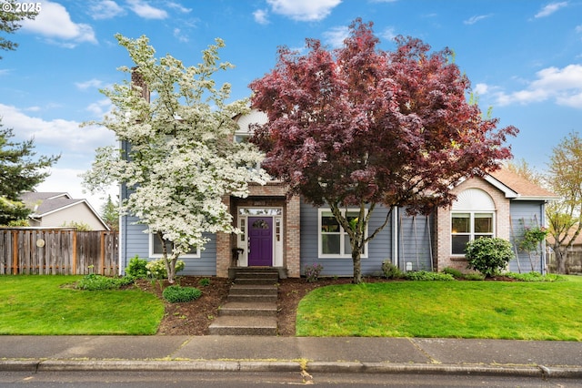28575 SW Sandalwood Dr, Wilsonville, OR 97070 - view of property hidden behind natural elements featuring brick siding