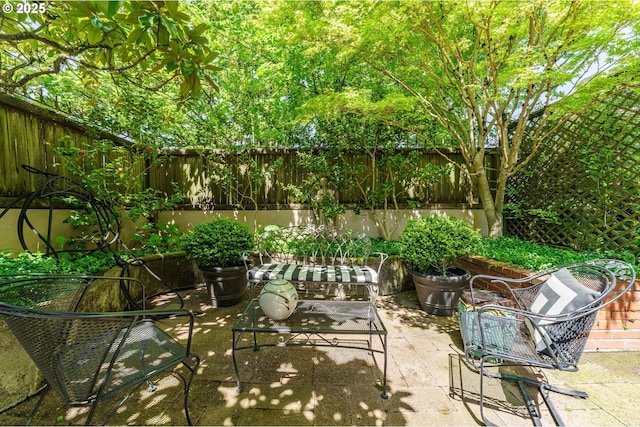 2323 SW Park Pl Unit 106, Portland, OR 97205 - view of patio with a fenced backyard