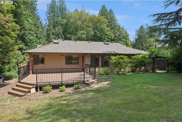 18194 Shady Hollow Way W, Linn, OR 97068 - back of house featuring a lawn, a shingled roof, and a deck