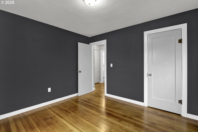 1262 Kalmia St, Junction City, OR 97448 - spare room with baseboards and wood finished floors