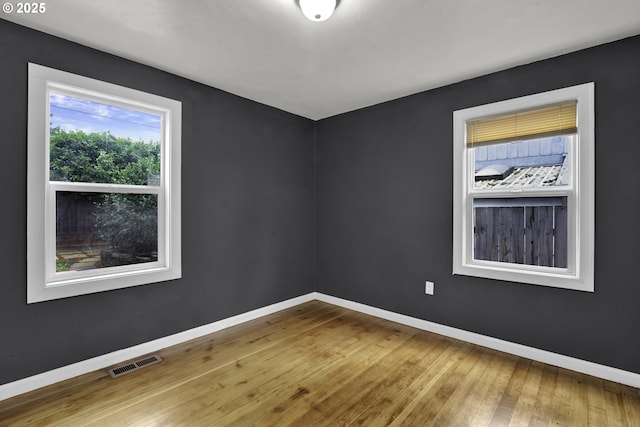 1262 Kalmia St, Junction City, OR 97448 - empty room with wood-type flooring, baseboards, and visible vents